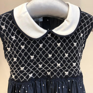 Vestido azul puntos con bordado lazos